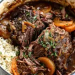 Cider Braised Pot Roast with Caramelized Onions and Cauliflower Rice.